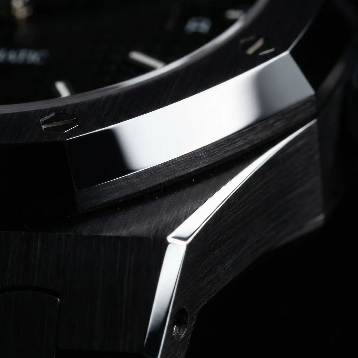 AP Royal Oak bezel macro showing brushed and polished finishing transition
