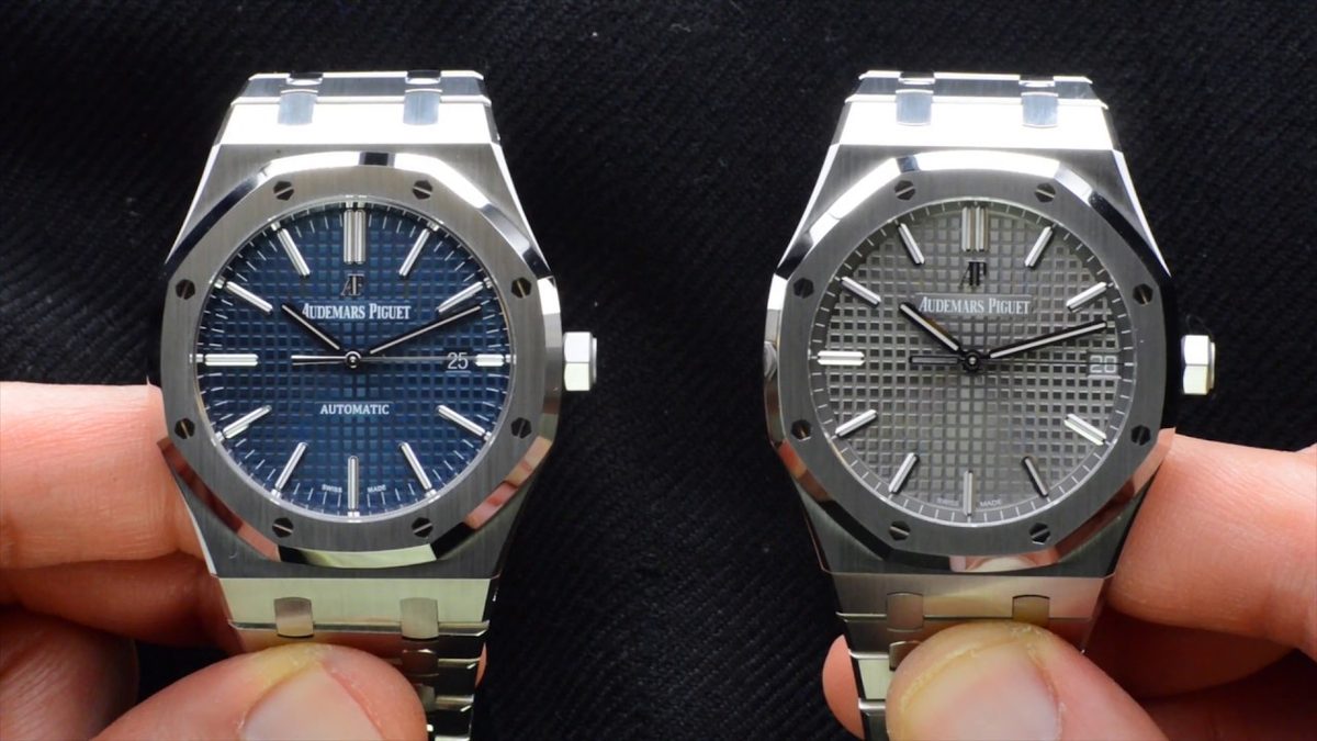 Audemars Piguet Royal Oak 15400 blue and 15500 grey held side by side in hand