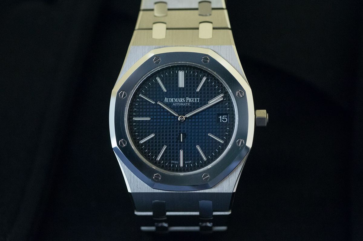 Audemars Piguet Royal Oak blue dial showing octagonal bezel screws and tapisserie