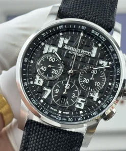 AP Code 11.59 26048 black dial crown detail