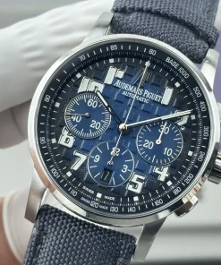 AP Code 11.59 26048 blue dial bezel detail